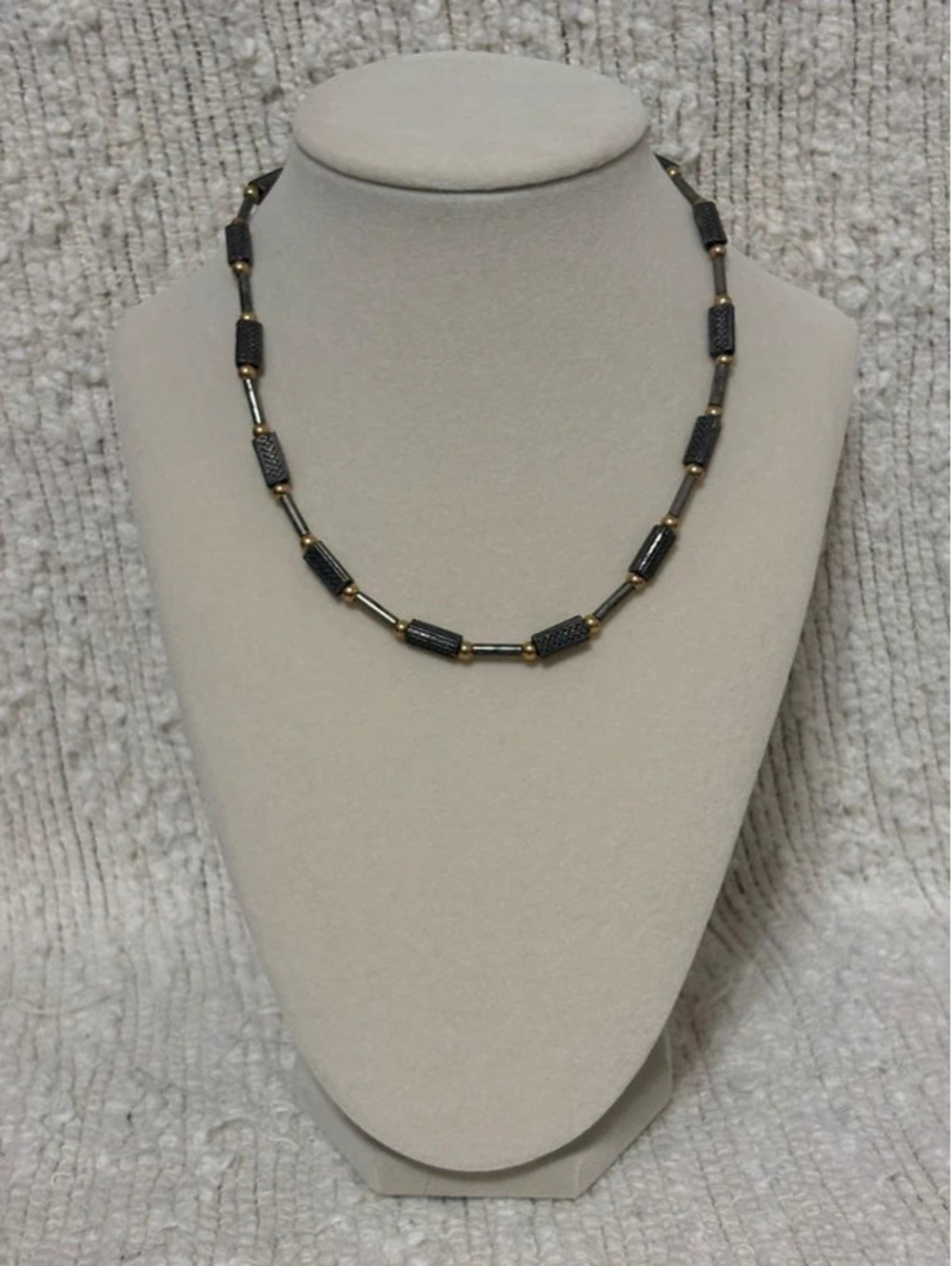 Silver and gold toned metal beaded necklace